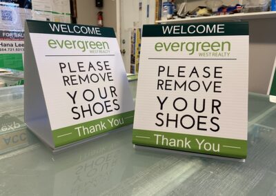 Please remove your shoes sign real estate